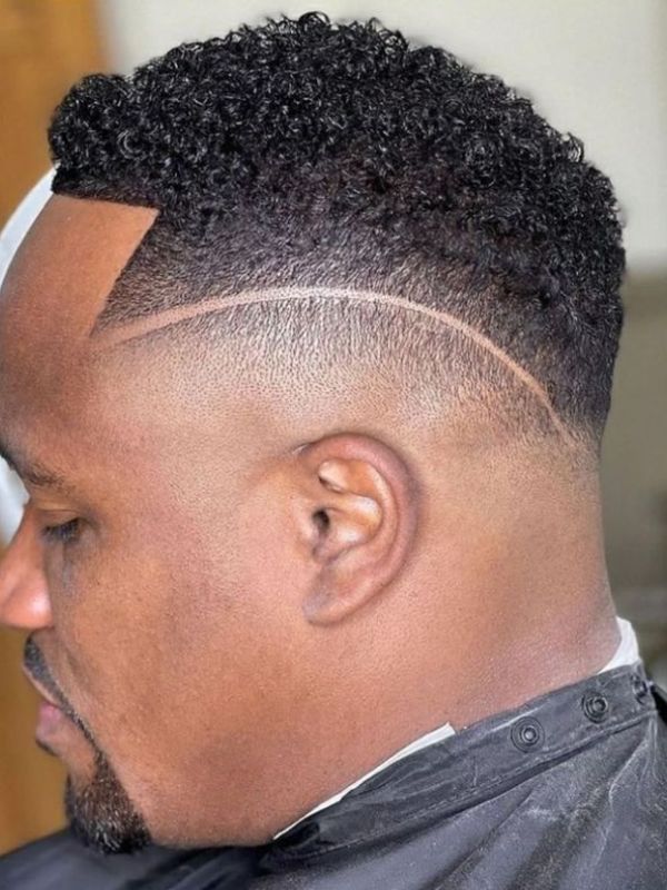 Afro + Bald Fade Undercut