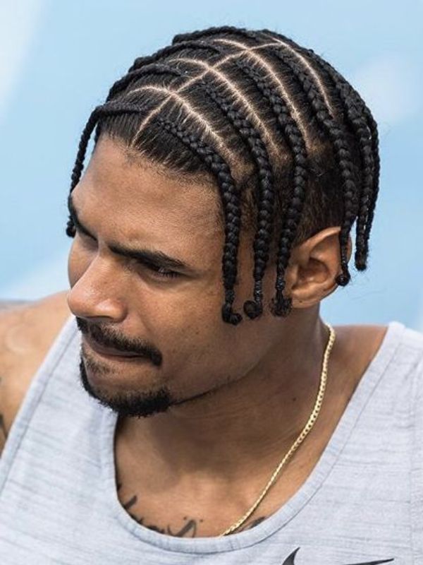 Dreadlocks or Braids with Mid Fade
