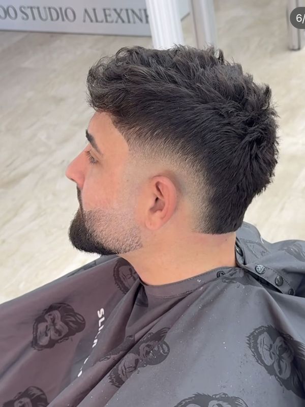 Mohawk or Faux Hawk with Mid Fade