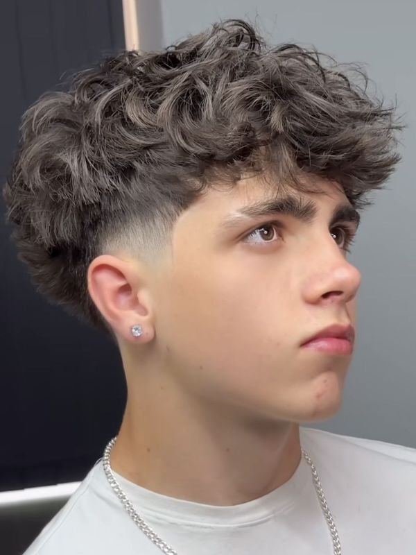 Low Taper Fade Haircut Fluffy Hair