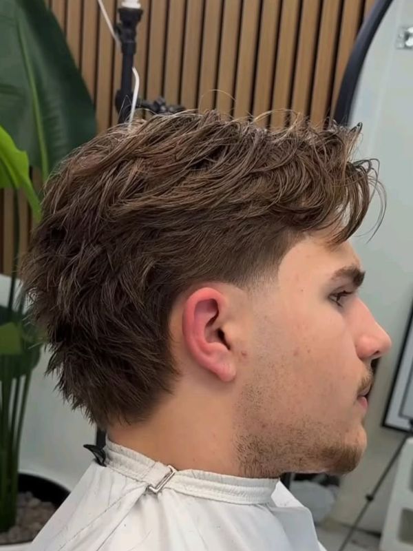 Why the Low Taper Fade Mullet Is Dominating 2026