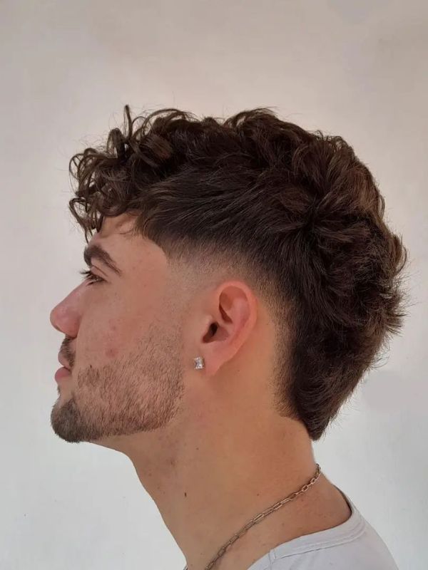 Burst Fade Curly Mullet