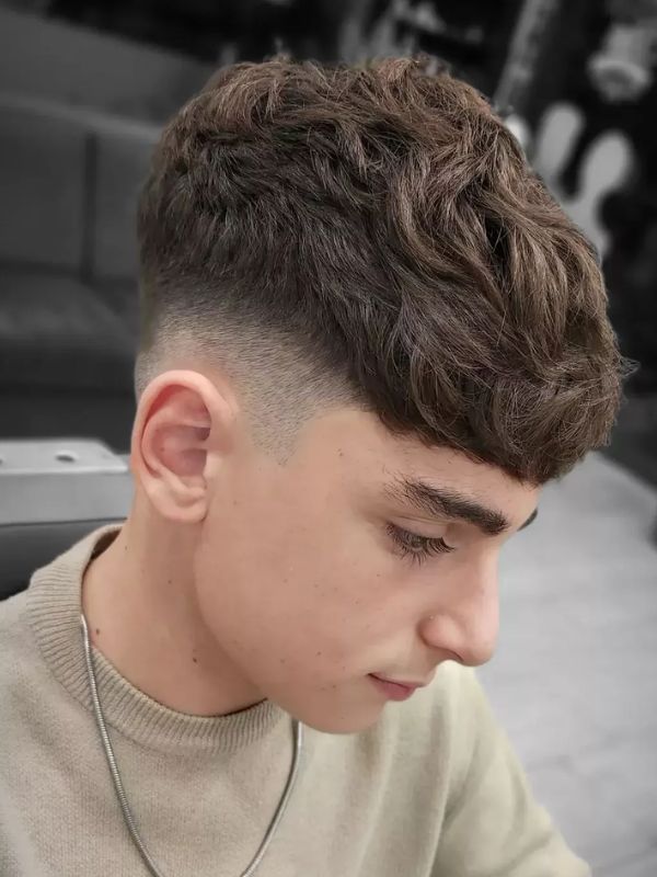 Low taper fade Textured Fringe curly